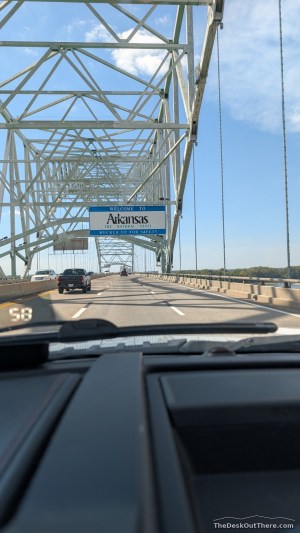 Arkansas welcome sign on the bridge while heading west.