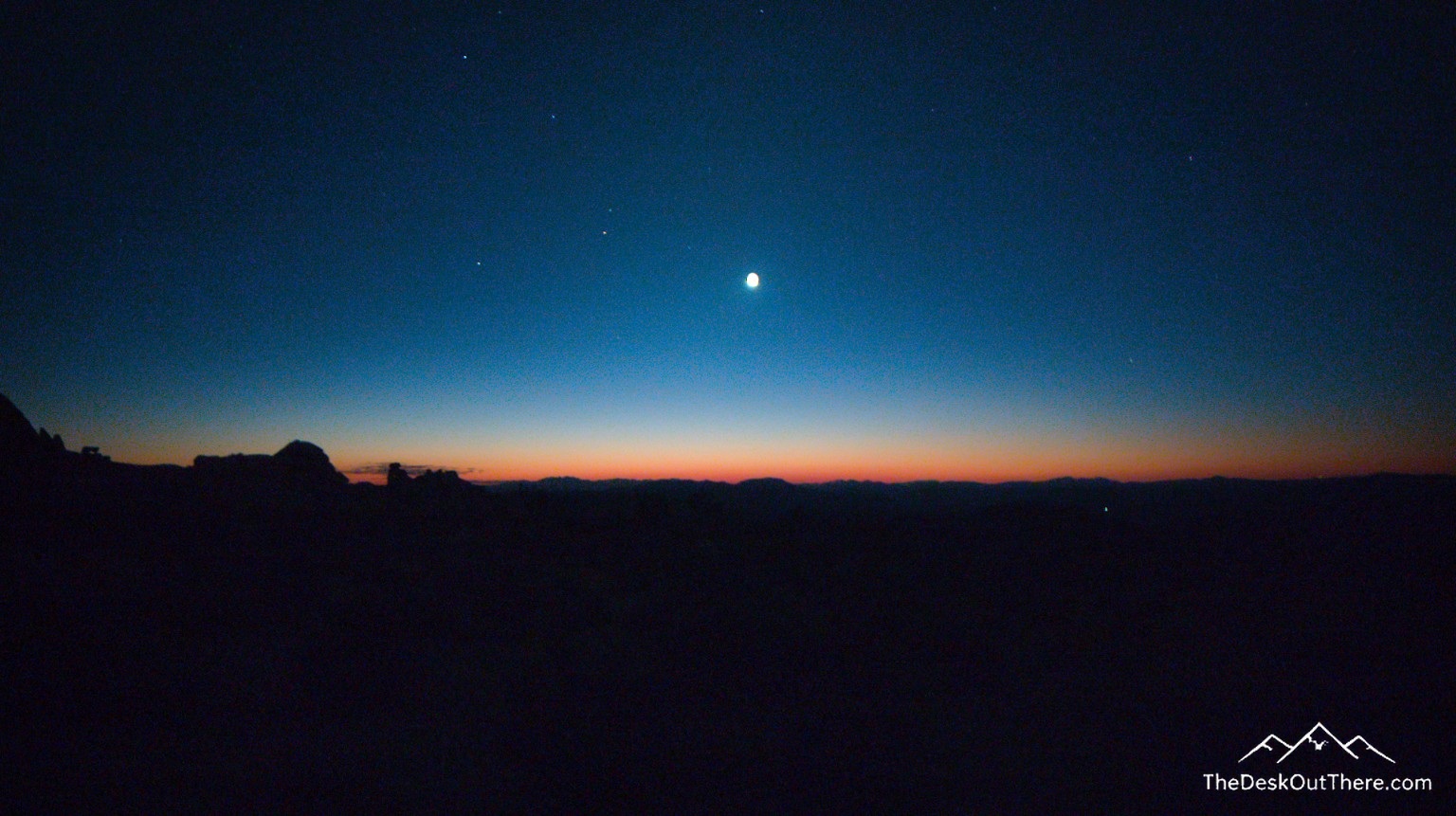 Moon and early light at the Rock