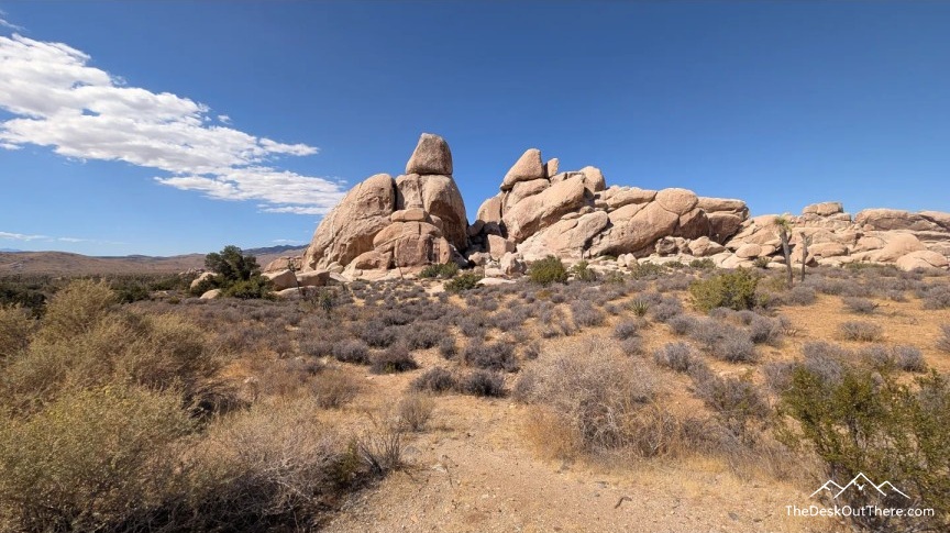 Desert rock formations under a blue sky
